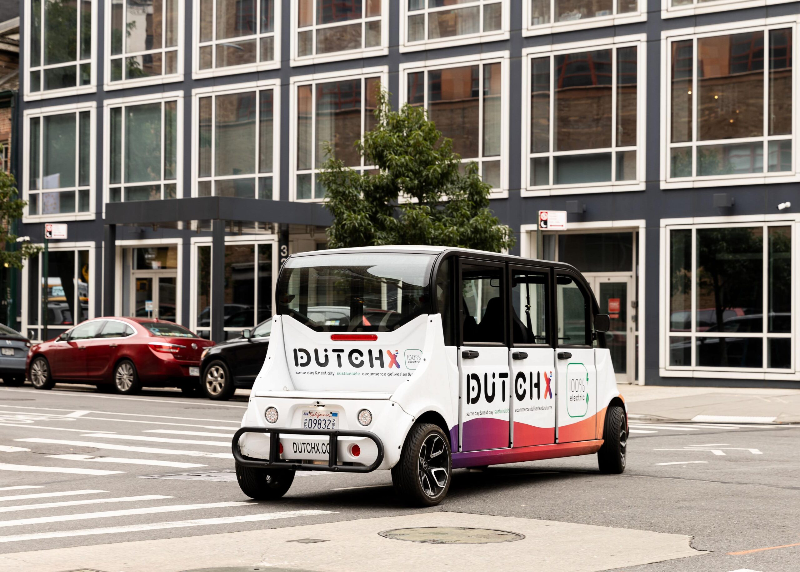 Electric delivery vehicle branded with DutchX